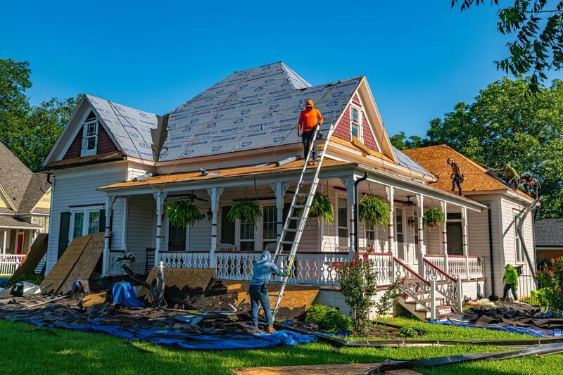 Storm damage roof repair service in Tempe fixing wind and rain damage