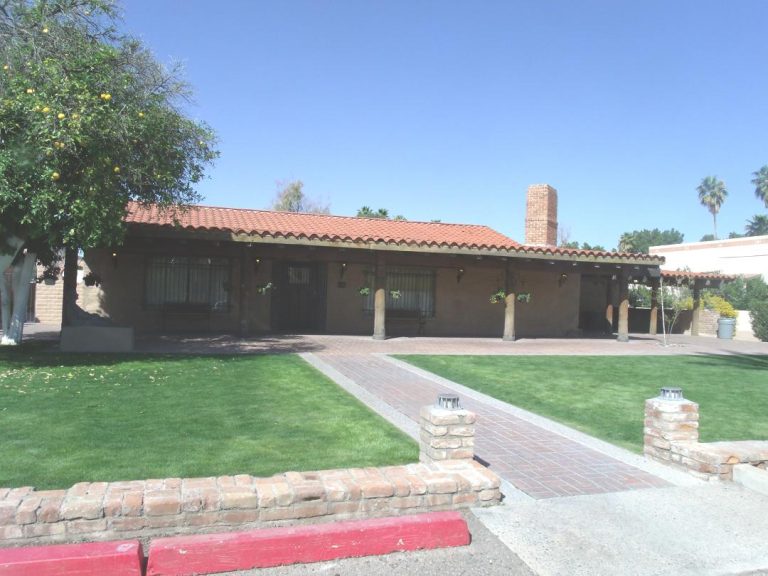 Residential home exterior in the Phoenix East Valley, representing a house where a musty attic smell could signal a hidden roof leak